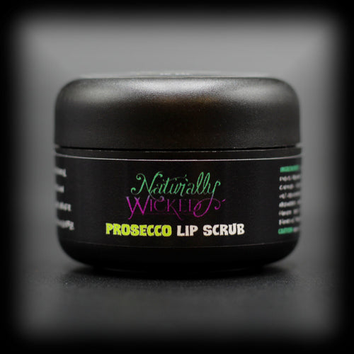 Naturally Wicked Prosecco Lip Scrub With Natural & Vegan Ingredients In Luxury Black Container On Dark Background