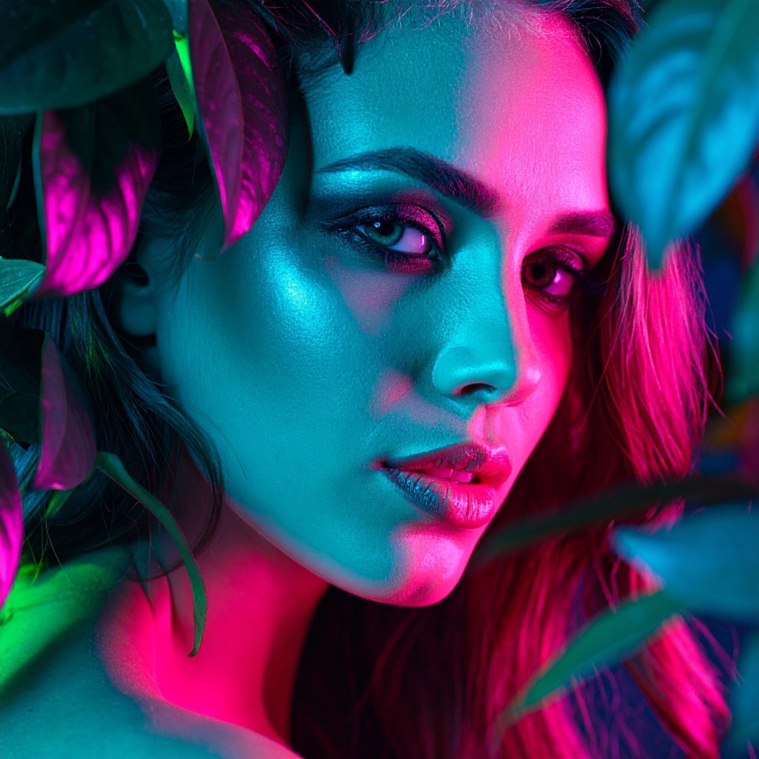 Beautiful, Naturally Wicked Woman's Face Looking Outward Under The Focus Of Green & Purple Wicked Light