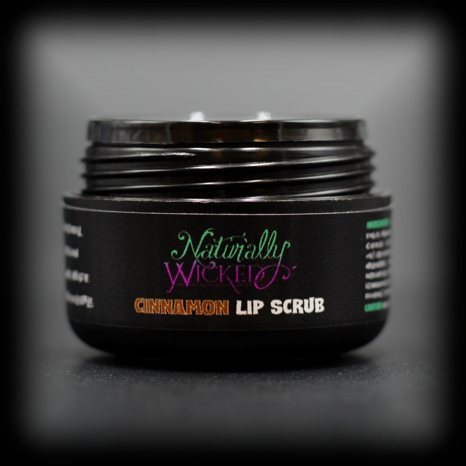 Naturally Wicked Cinnamon Lip Scrub In Luxury Container With Lid Removed & Seal/Shive Visible