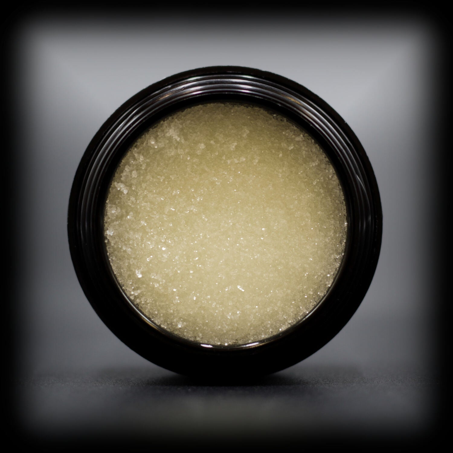 Naturally Wicked Exfoliating Sugar Cinnamon Lip Scrub Visible With Lid Removed & Sugar Crystals Exposed