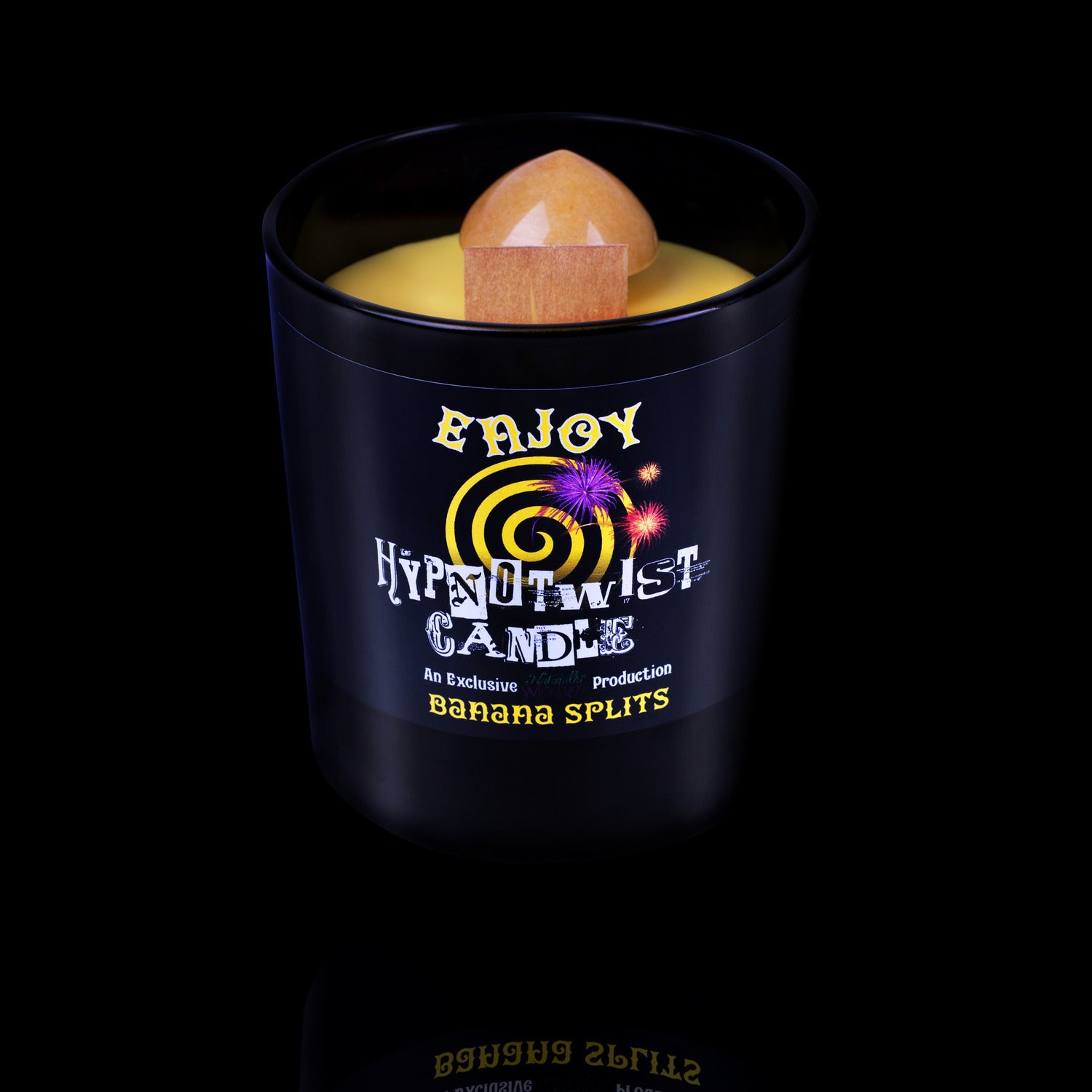 Naturally Wicked Hypnotwist Enjoy Candle Featuring Plant-based Soy Yellow Wax Scented with Banana Splits & Includes A Yellow Jade Crystal Spinning Top.