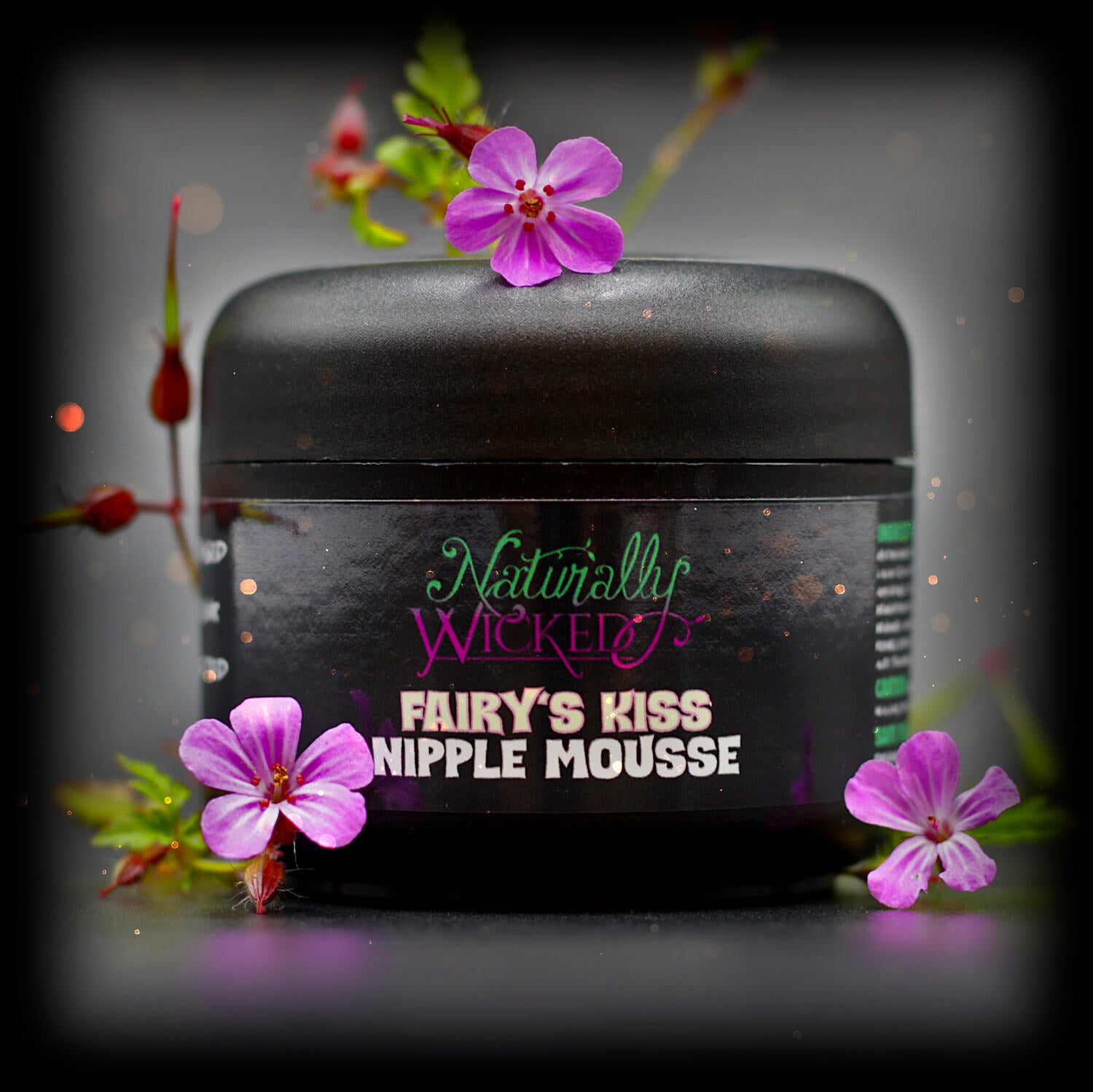 Naturally Wicked Fairy's Kiss Nipple Mousse Surrounded By Magical Fairy Dust & Enchanting Pink Flowers