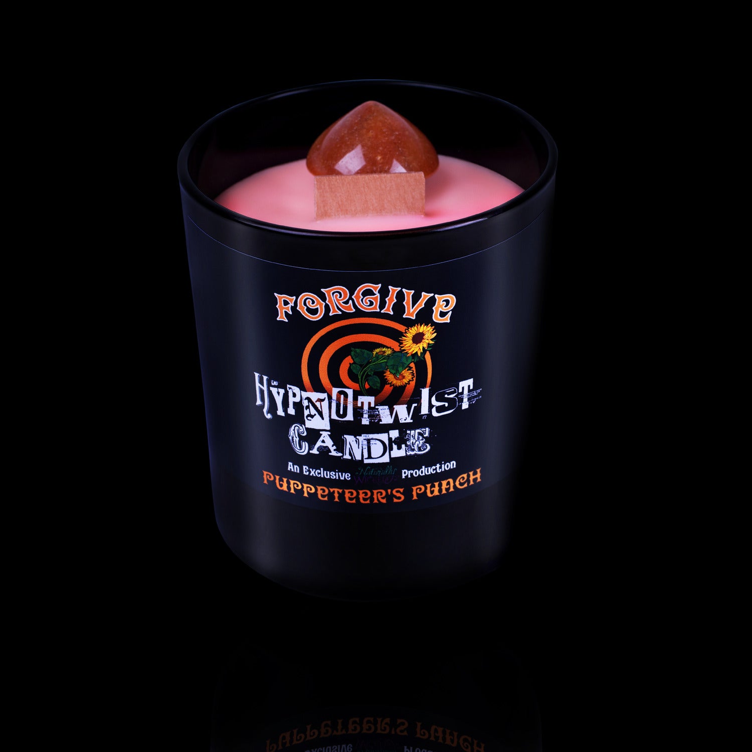 Naturally Wicked Hypnotwist Forgive Candle Featuring Plant-based Soy Orange Wax Scented with Puppeteer's Punch & Includes An Orange Aventurine Crystal Spinning Top.