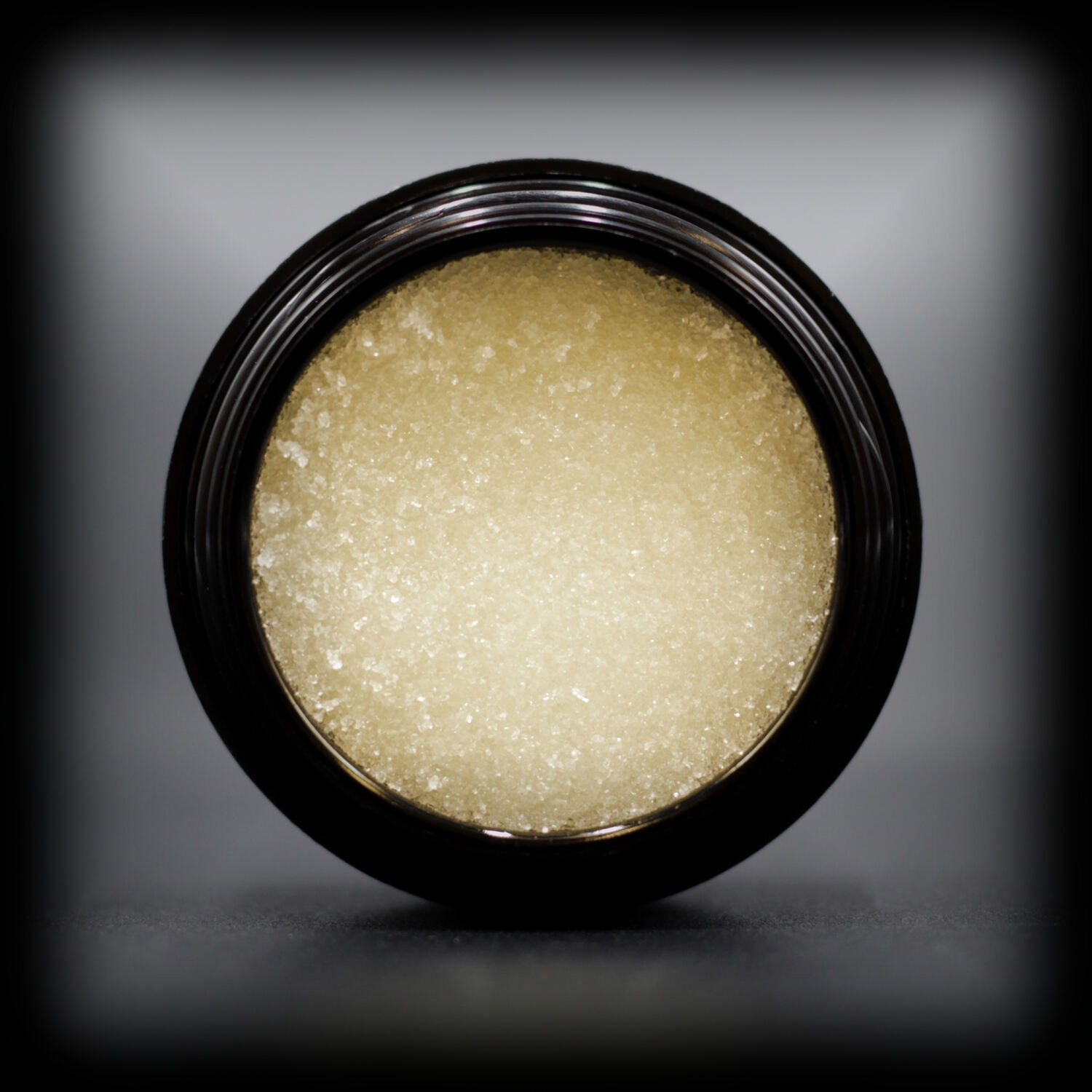 Naturally Wicked Exfoliating Sugar Grapefruit Lip Scrub Visible With Lid Removed & Sugar Crystals Exposed