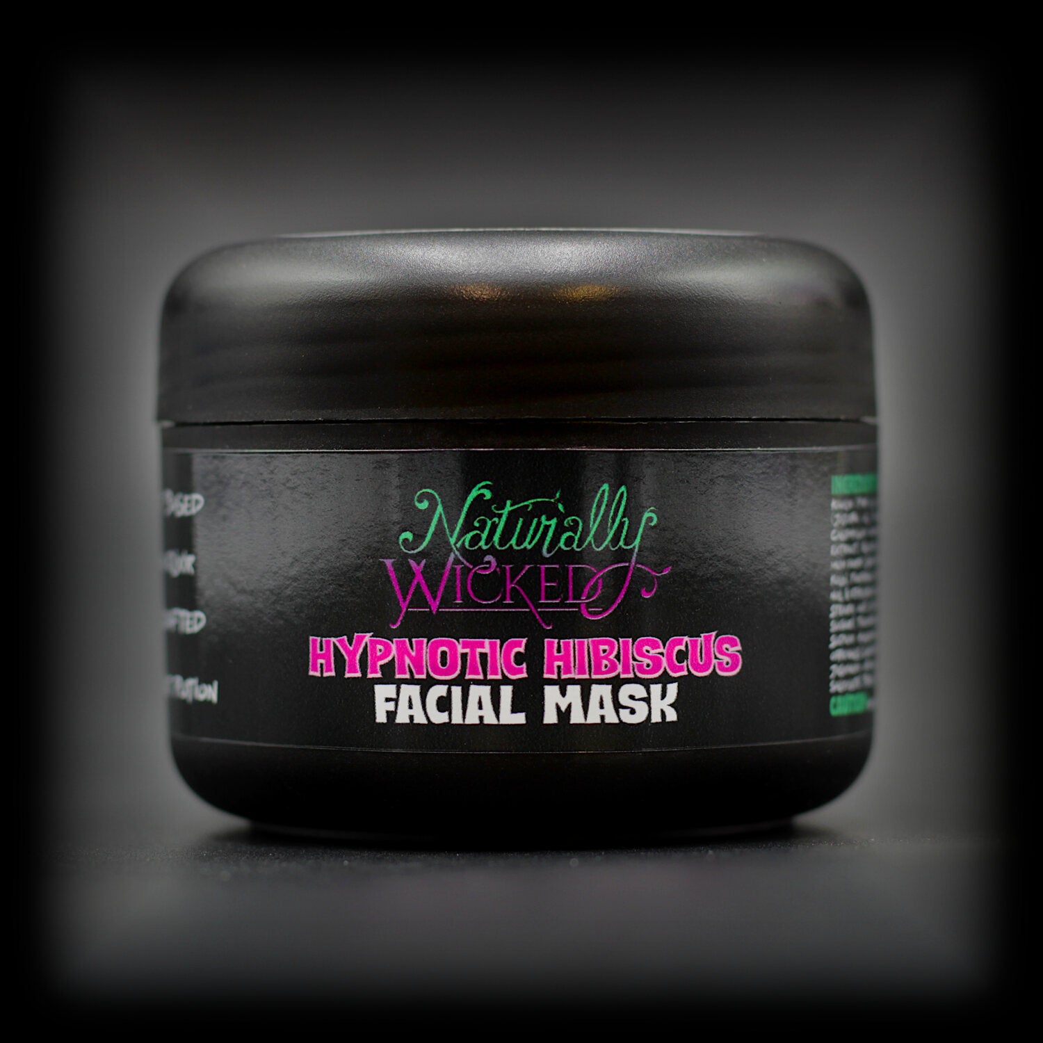 Naturally Wicked Hypnotic Hibiscus Facial Mask in chic black tub with eye-catching label.