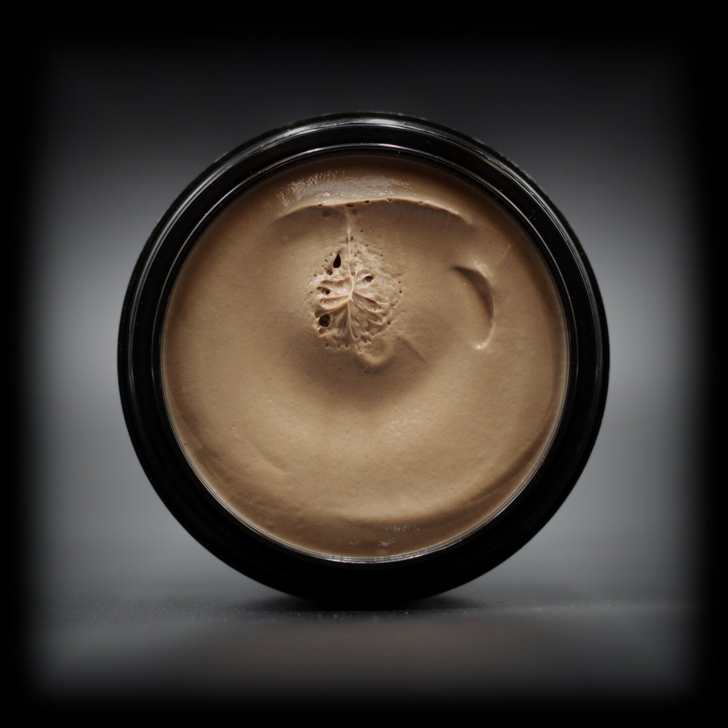 Top view of Naturally Wicked Hypnotic Hibiscus Facial Mask with smooth, creamy texture in a rich pink shade.