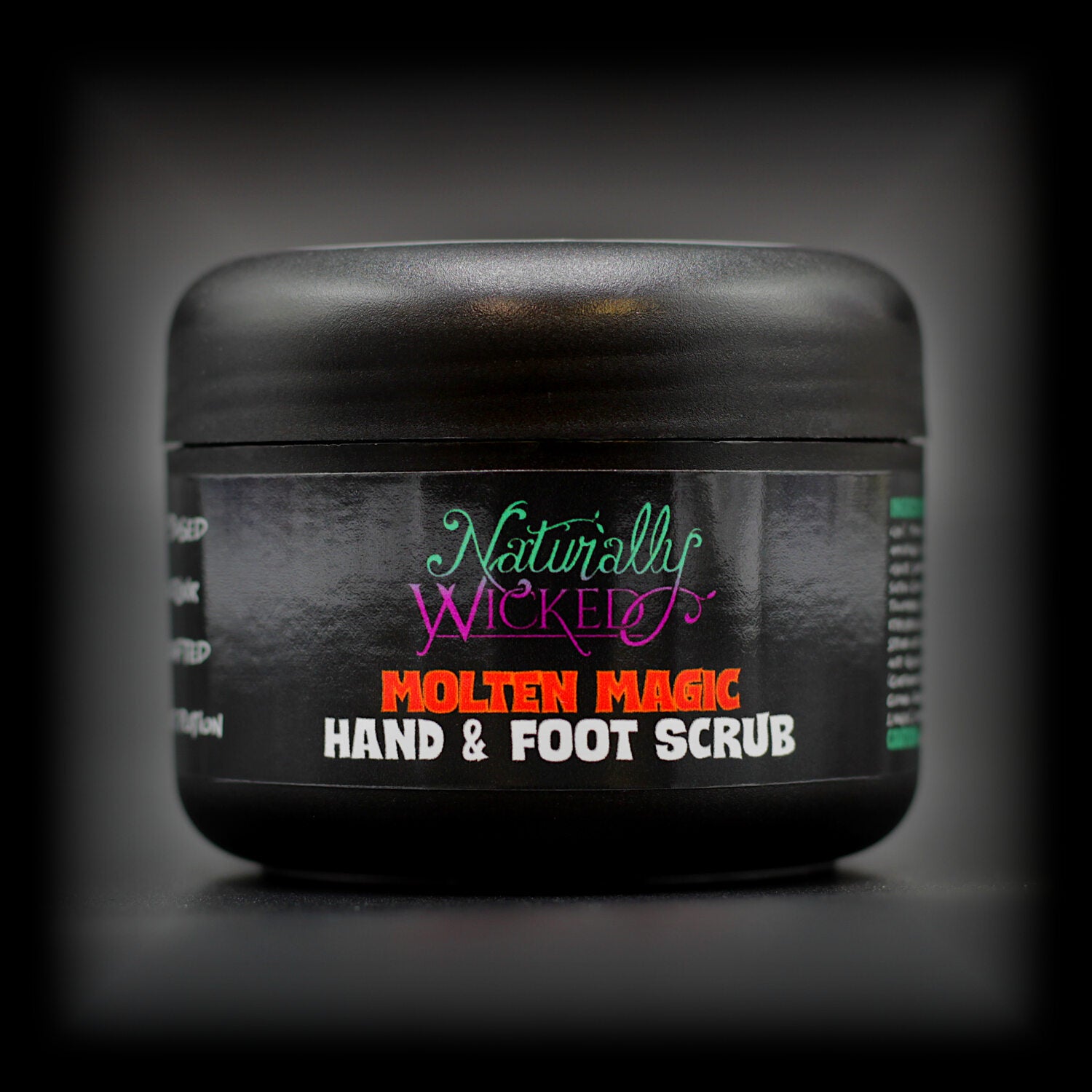 Naturally Wicked Molten Magic Hand & Foot Scrub in sleek black packaging with vibrant red text.