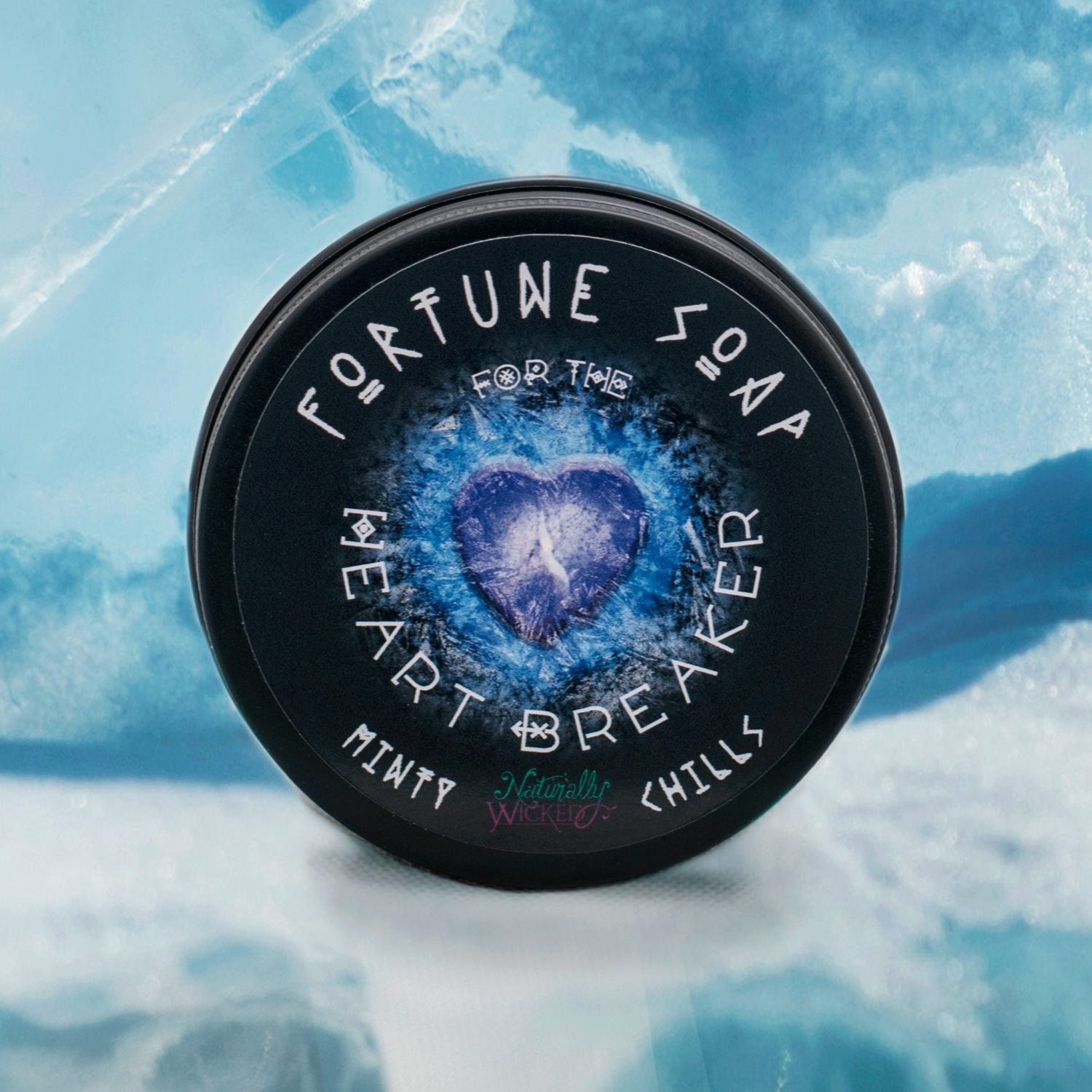 Naturally Wicked Heart Breaker Fortune Soap container with a heart design on a blue marble background