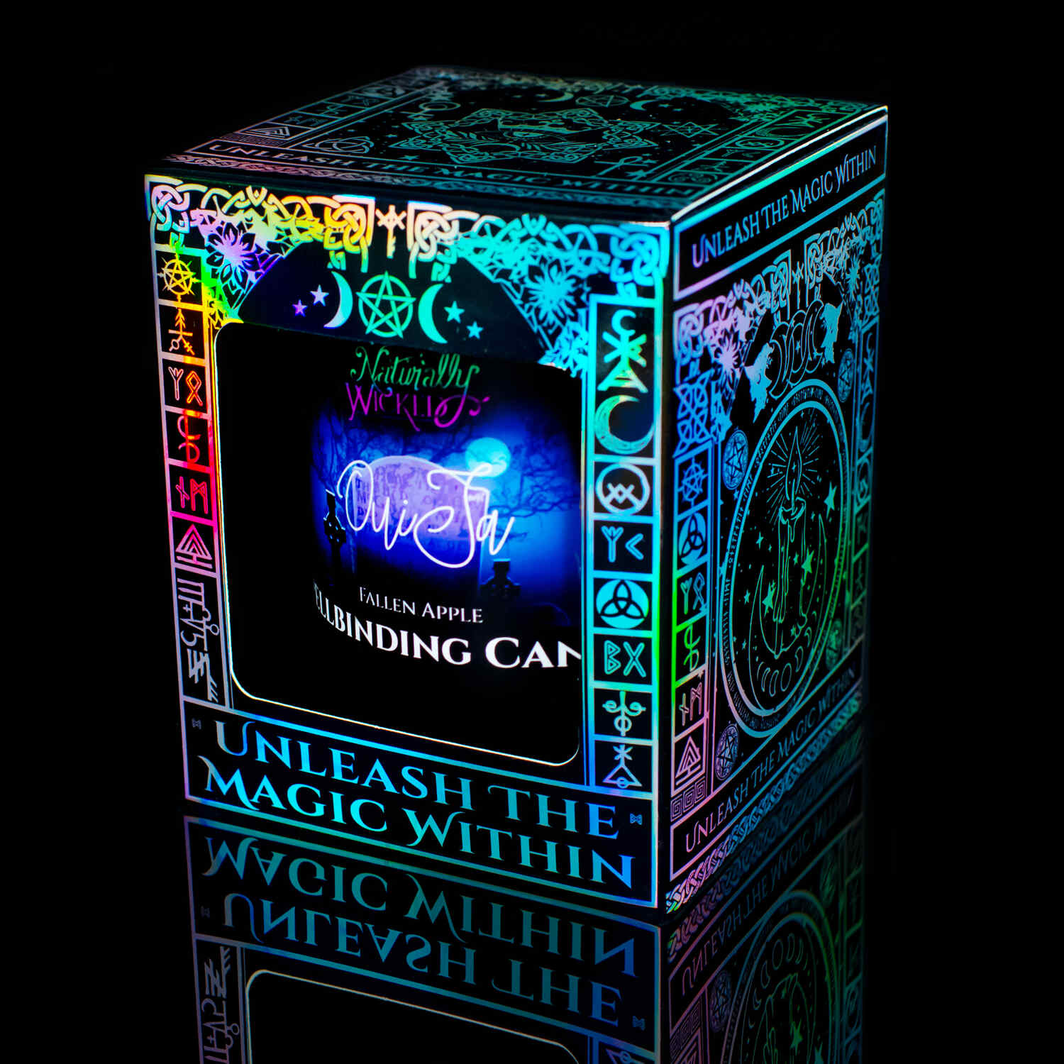 The Perfect Spell Candle For The Brave. Naturally Wicked Spellbinding Ouija Candle Displayed In An Enchanting Iridescent Gloss Gift Box, Which Invites Its User To 'Unleash The Magic Within'.