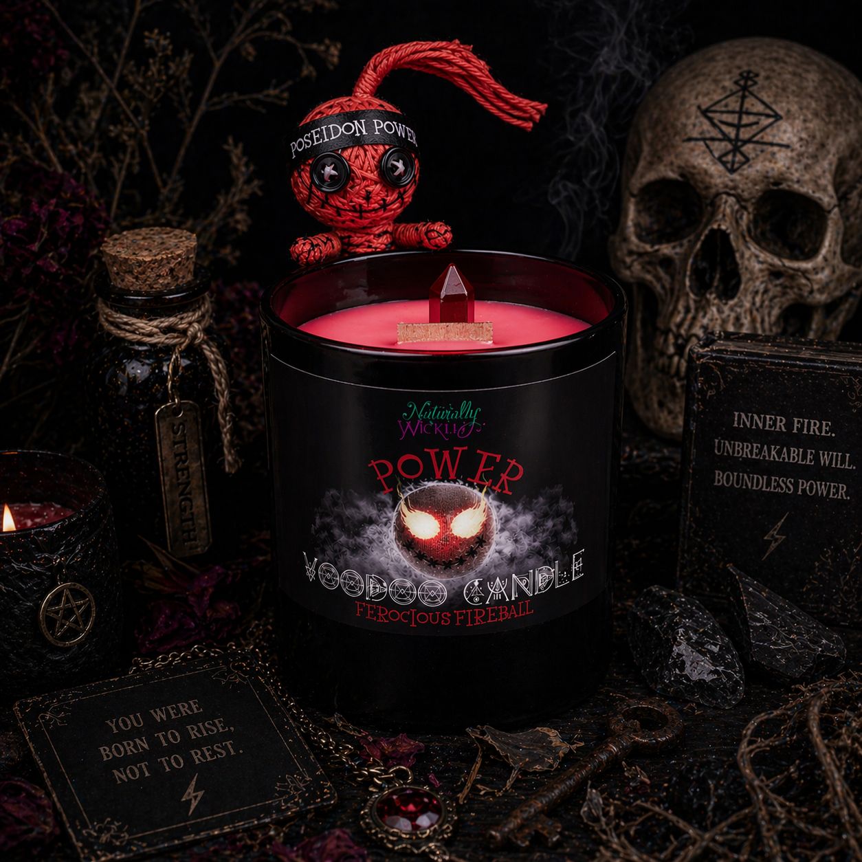 Voodoo Power Candle With Red Voodoo Doll In Power Ritual, Amongst Affirmation Cards, Potion, A Skull & Other Witchy Accessories In Dim Light