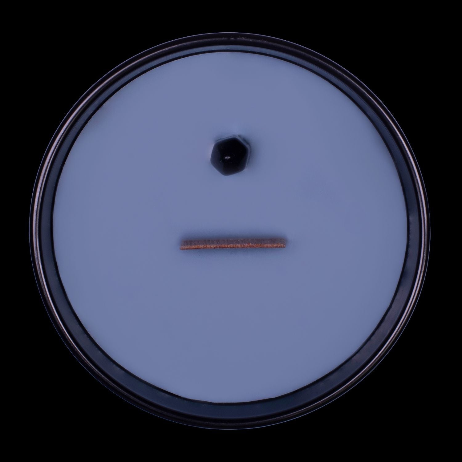 Naturally Wicked Voodoo Protection Crystal Candle View From Above Shows Black Smooth Plant-based Wax, Featuring A Wooden Wick And Black Obsidian Quartz Crystal Wand. All Situated Within A Black Gloss Glass Container.