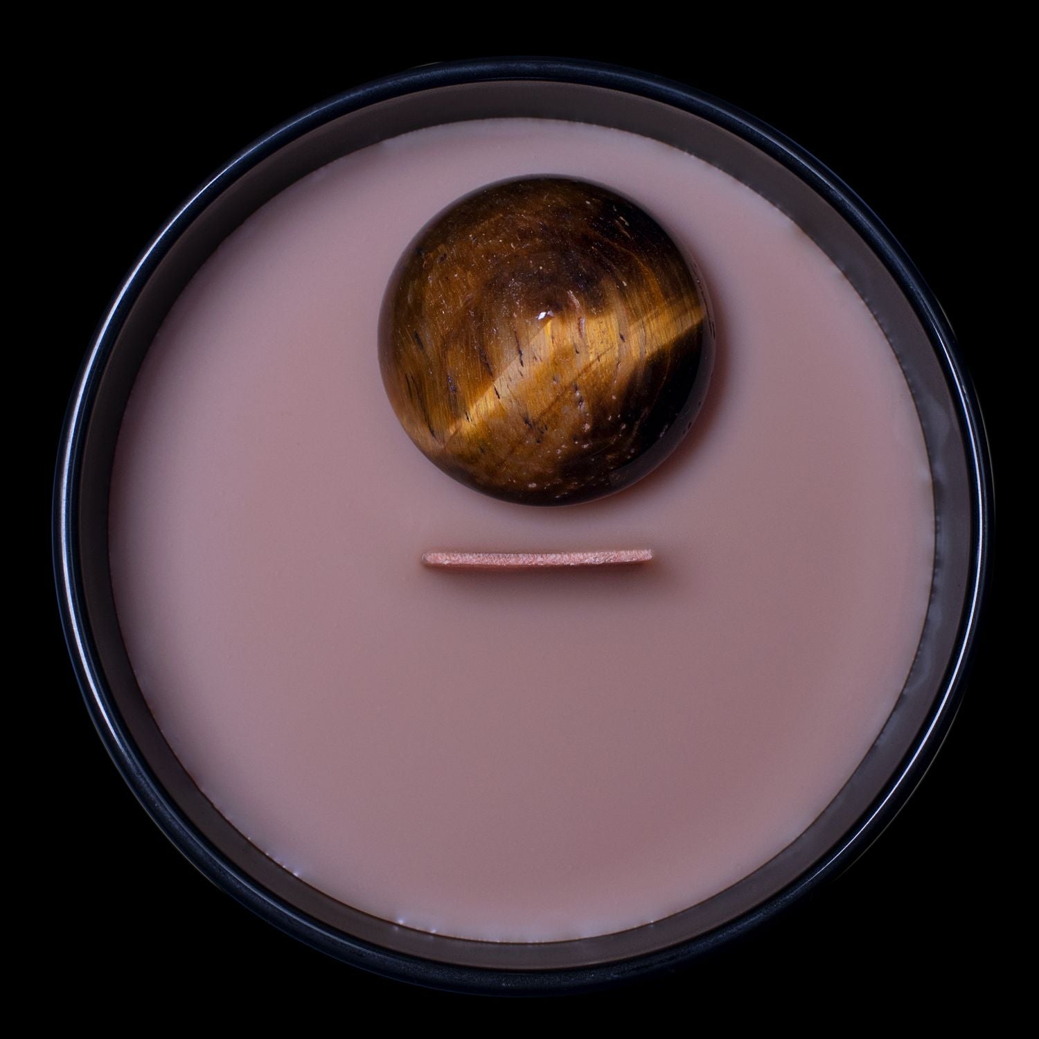 Birds Eye View Of The Naturally Wicked Hypnotwist Remember Candle Featuring Plant-based Soy Brown Wax Scented With Fudge Flashbacks & Includes A Tiger's Eye Crystal Spinning Top & Wooden Wick