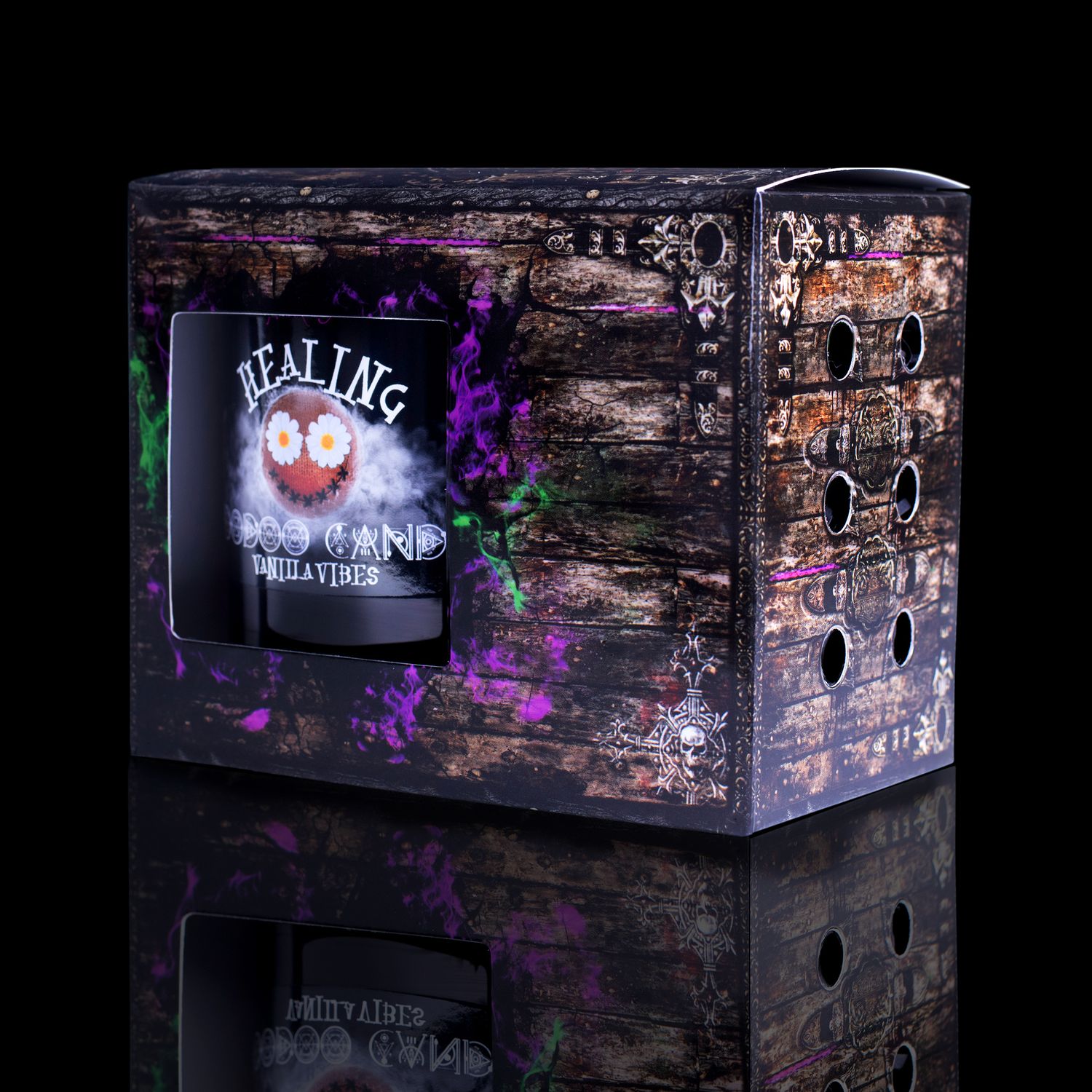 Side View Of The Fabulously Haunting Voodoo Healing Spell Candle. Naturally Wicked Voodoo Healing Candle Displayed In A Gift Box. The Candle Features Plant-Based Smooth White Wax, A Wood Wick, White Voodoo Doll And A Beautiful Clear Quartz Crystal Wand.