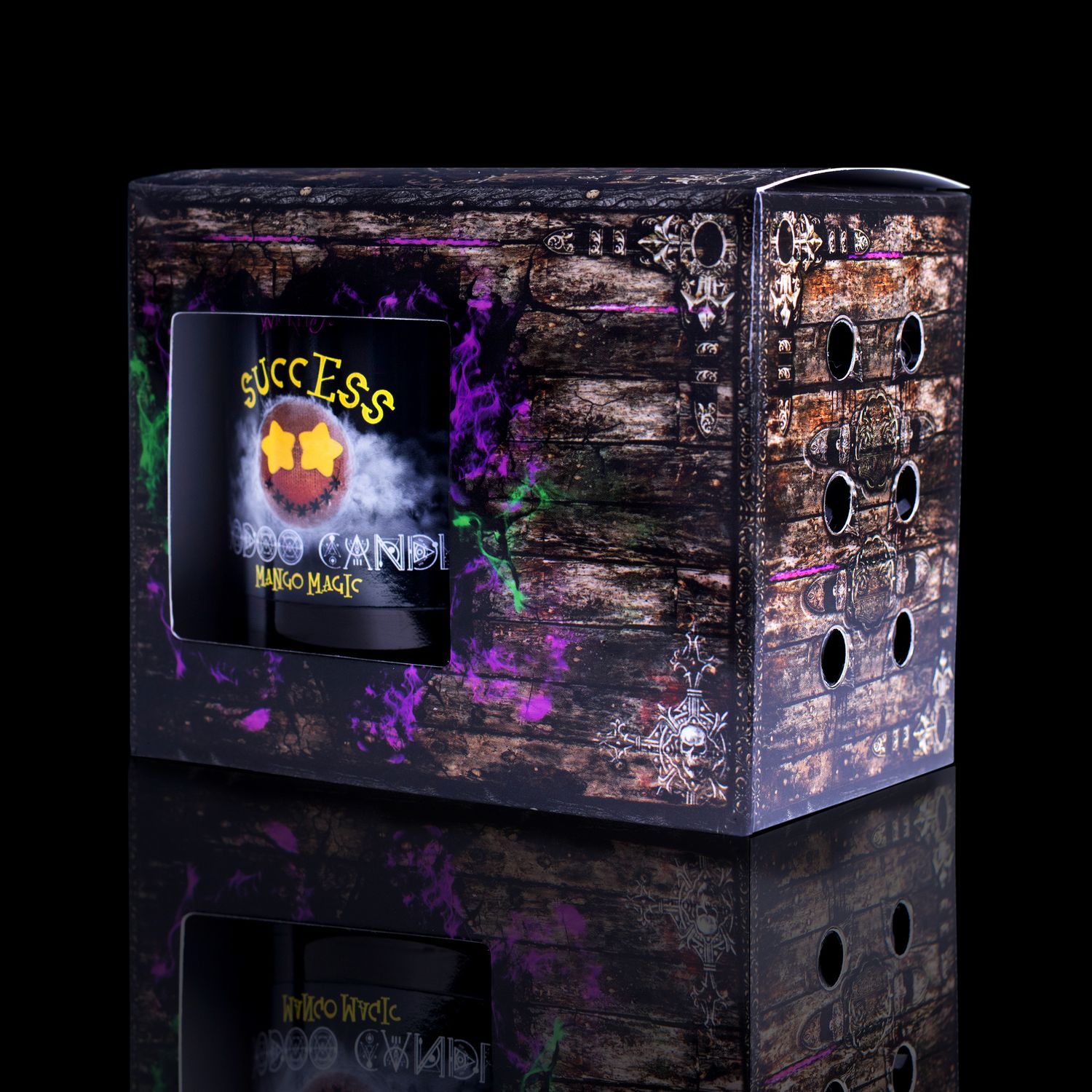 Side View Of The Fabulously Haunting Voodoo Success Spell Candle. Naturally Wicked Voodoo Success Candle Displayed In A Gift Box. The Candle Features Plant-Based Smooth Yellow Wax, A Wood Wick, Yellow Voodoo Doll And A Beautiful Yellow Jade Crystal Wand.